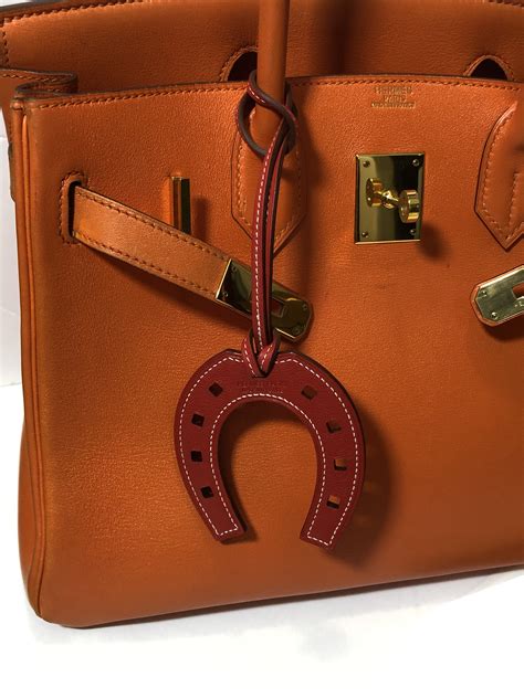 hermes leather charms|hermes charm for bag.